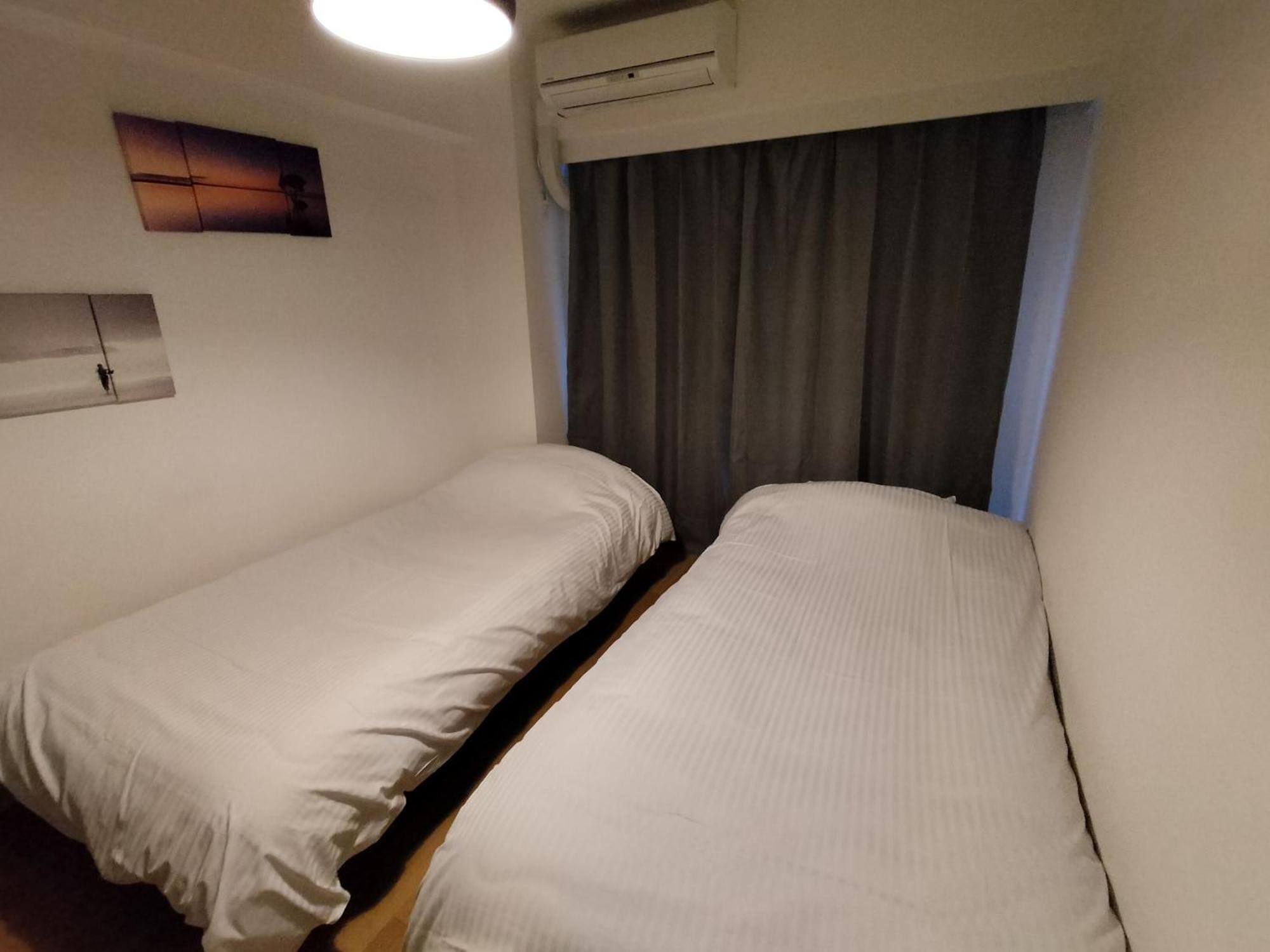 Ferienwohnung Amber Iidabashi Präfektur Tokio Zimmer foto