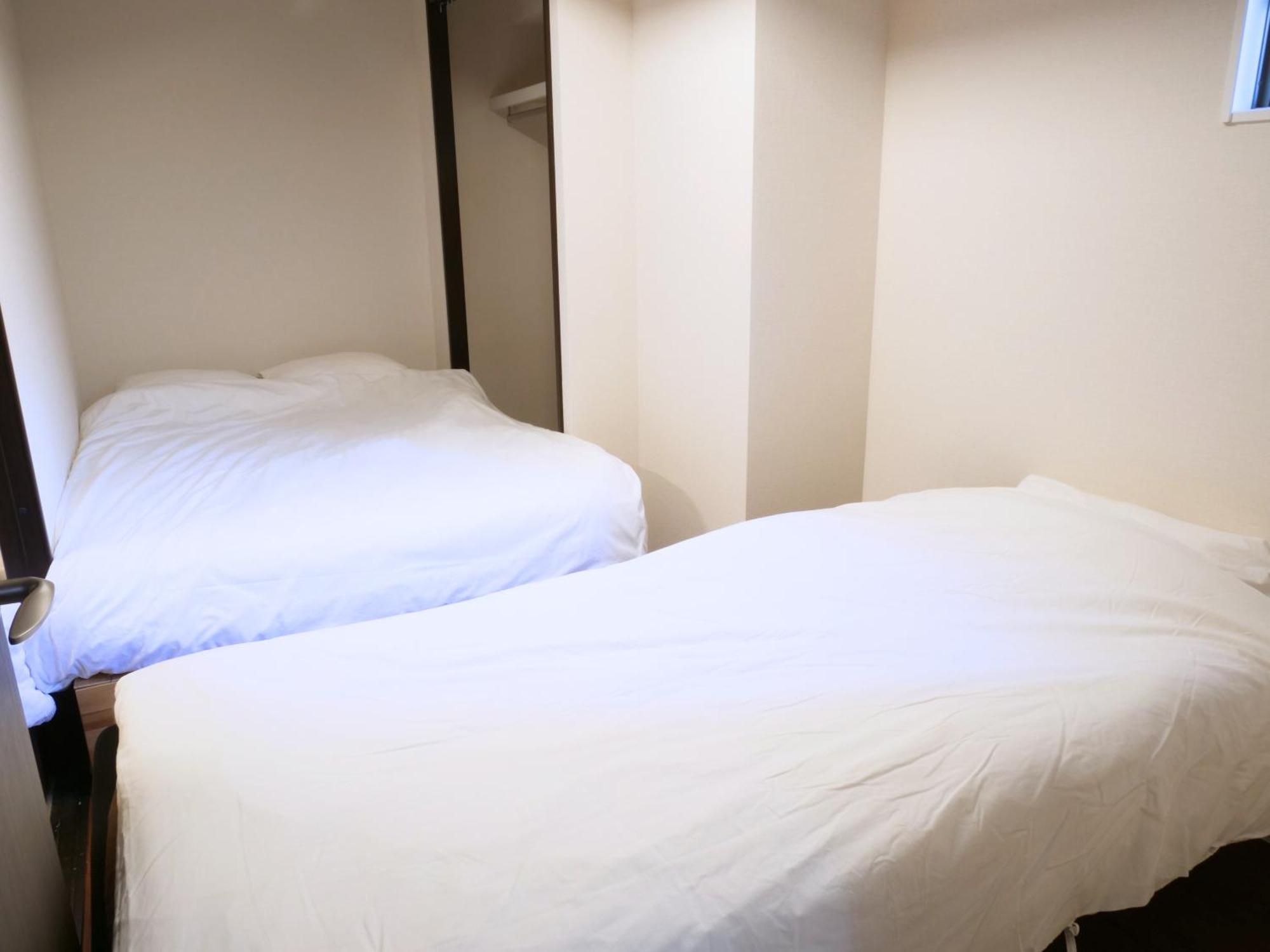 Ferienwohnung Amber Iidabashi Präfektur Tokio Zimmer foto